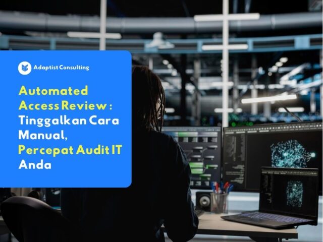 Karyawan yang sedang memantau dashboard keamanan sistem informasi untuk mengevaluasi hak akses menggunakan proses automated access review secara terpusat.