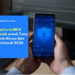 karyawan yang sedang memverifikasi akses login ke sistem perusahaan menggunakan aplikasi Multi-Factor Authentication (MFA) di layar smartphone.