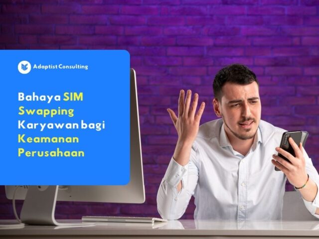 Seorang karyawan pria tampak bingung melihat smartphone-nya yang mendadak kehilangan sinyal seluler, mengilustrasikan momen saat menjadi korban serangan SIM Swapping.