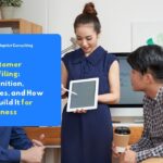 Business team discussing customer profiling strategy using a tablet and analytics data in the office.