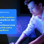 Seorang profesional berinteraksi dengan antarmuka teknologi digital holografik, menggambarkan penerapan facial recognition dalam keamanan identitas bisnis modern.