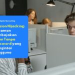 Karyawan yang sedang mengakses portal aplikasi internal perusahaan melalui laptop untuk merepresentasikan titik kerentanan serangan session hijacking.