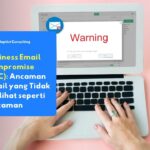 Ilustrasi laptop terbuka menampilkan antarmuka email dengan indikator peringatan, merepresentasikan ancaman Business Email Compromise (BEC) yang menyasar komunikasi bisnis digital.