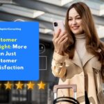 The customer smiles while holding their smartphone after completing an online purchase, reflecting a customer experience that exceeds their expectations.