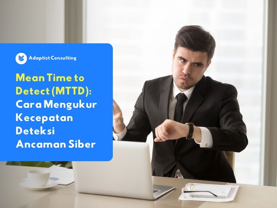 Seorang pengusaha berkemeja yang sedang memeriksa jam tangannya sambil bekerja di depan laptop, menggambarkan betapa pentingnya kecepatan deteksi dalam keamanan siber.