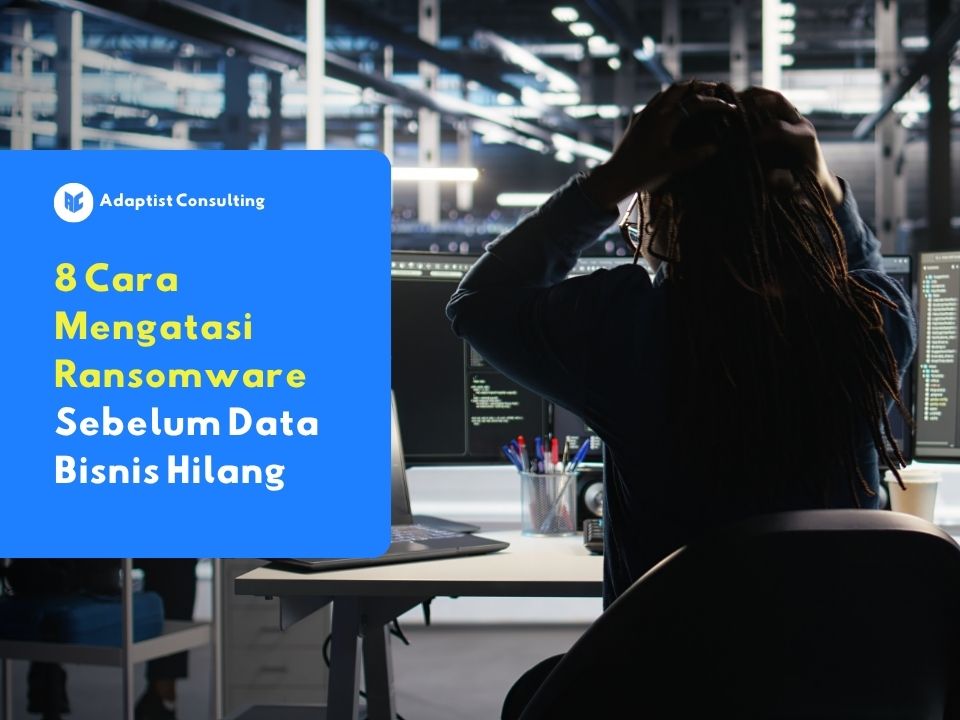 Tim IT menghadapi serangan ransomware saat mengakses server perusahaan, layar komputer menampilkan sistem terkunci dan gangguan keamanan siber di kantor modern.