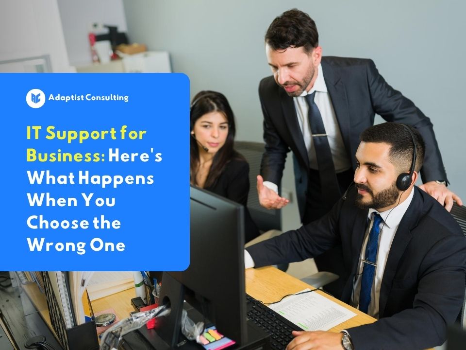 A professional IT Support technician monitoring company network systems on multiple computer screens in a modern office environment.