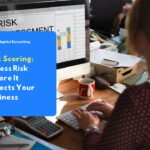 A professional working on a laptop displaying a risk assessment dashboard, illustrating the concept of structured risk scoring in business operations.
