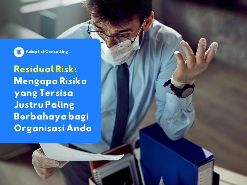 Residual Risk illustration: seorang profesional terlihat cemas sambil memeriksa dokumen di kantor, menggambarkan risiko tersembunyi yang masih tersisa meski kontrol keamanan telah diterapkan.