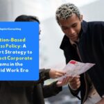 Two professionals discussing over a map, illustrating the concept of location-based access policy in corporate system security