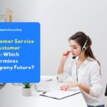 A female staff member with a headset and microphone working at an office desk, representing the concepts of Customer Service and Customer Care.