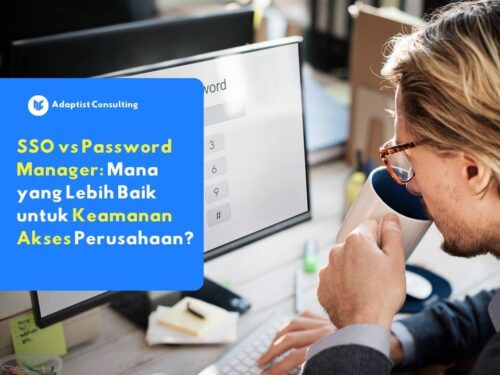 Seorang pria berkacamata menatap layar komputer yang menampilkan antarmuka pengisian kata sandi, sebagai ilustrasi dari Adaptist Consulting mengenai pemilihan sistem keamanan antara SSO dan password manager.