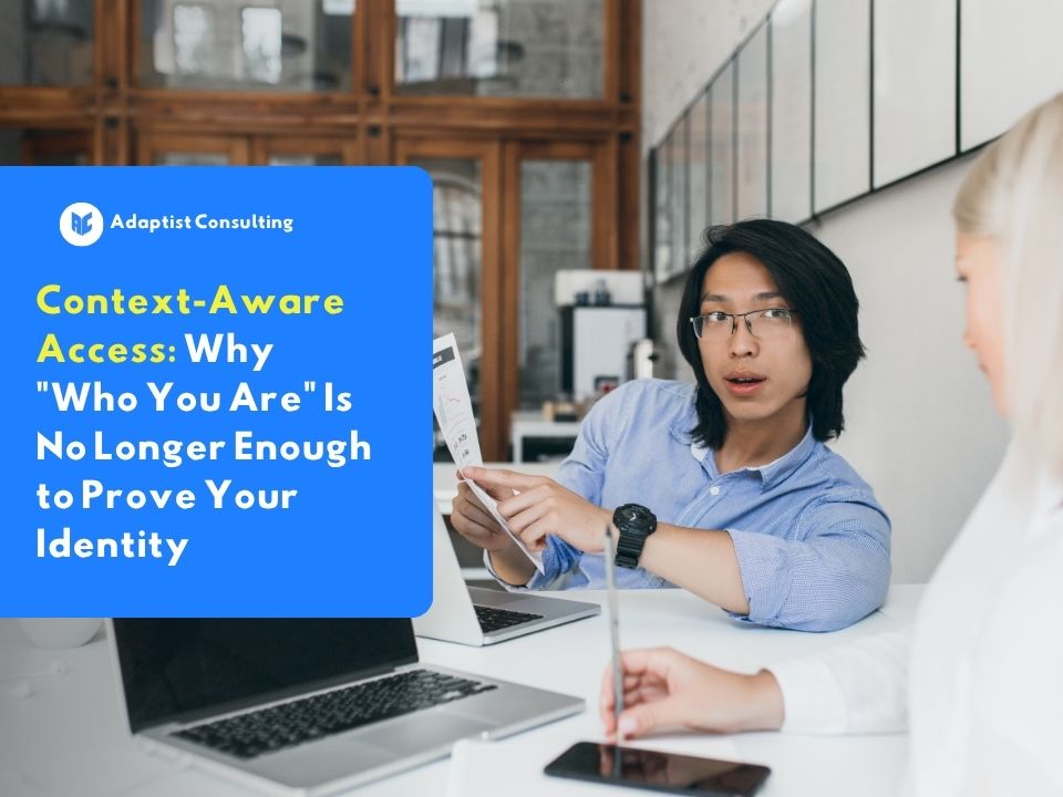 Two professionals are discussing system access security in the modern workplace, highlighting the importance of context-aware access in protecting corporate data.