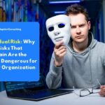 Residual Risk illustration: A professional looks anxious while reviewing documents in an office, illustrating the hidden risks that remain even after security controls have been implemented.