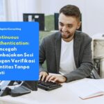 Karyawan yang sedang mengakses sistem internal perusahaan dengan aman melalui perangkat laptop berkat perlindungan Continuous Authentication yang berjalan secara transparan di latar belakang.