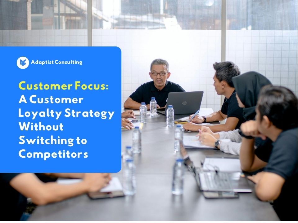 Employees discussing designing a customer focus strategy to increase B2B client loyalty and retention.