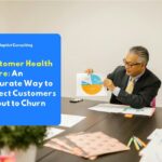 An employee is analyzing a client retention graph on a monitor screen to evaluate the company's Customer Health Score matrix.