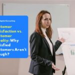 Employees are analyzing metric data on dashboards to identify the difference between transactional customer satisfaction and customer loyalty retention strategies to continuously increase corporate client trust.