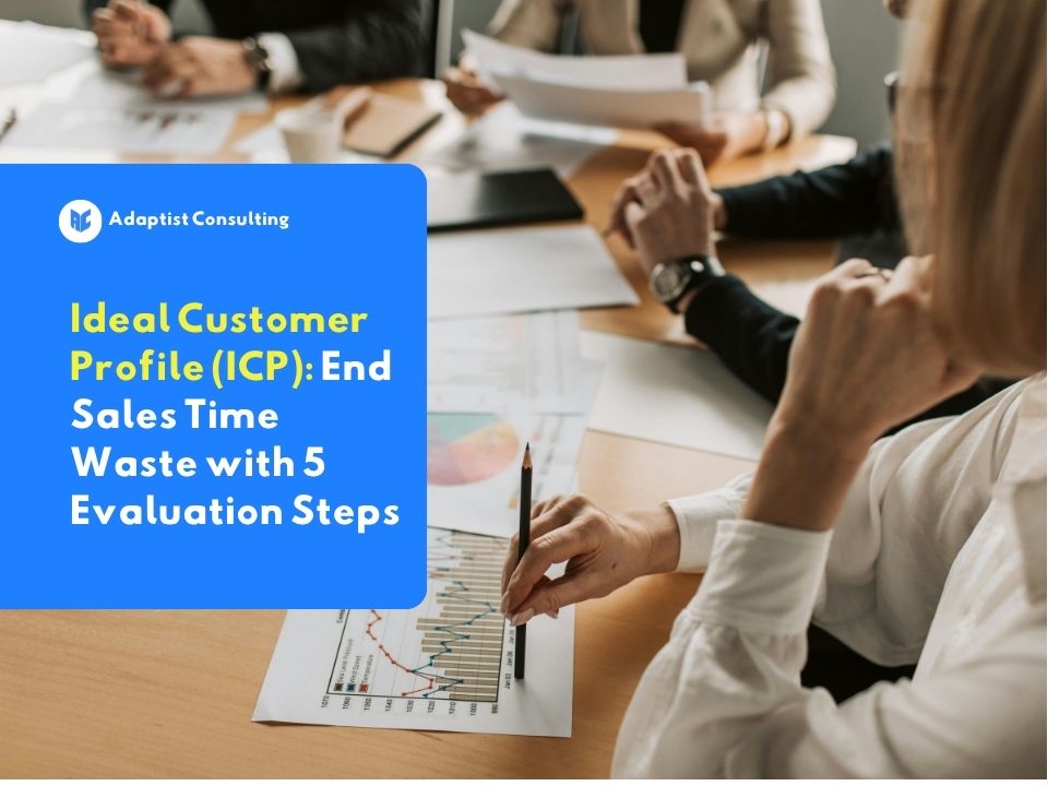 Employees discussing and analyzing data to compile the Ideal Customer Profile for a B2B company.