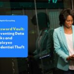 An employee who is focused on working in front of a computer screen while accessing company data securely using a password vault.