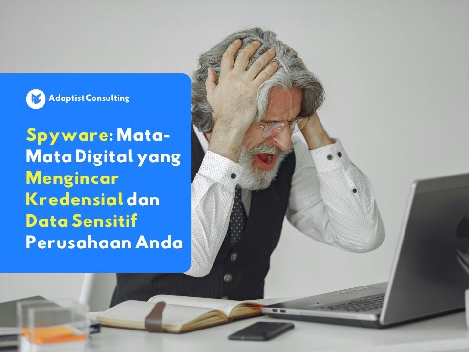 Karyawan yang sedang membuka email phishing tanpa menyadari adanya ancaman spyware yang mengincar kredensial sistem perusahaan.