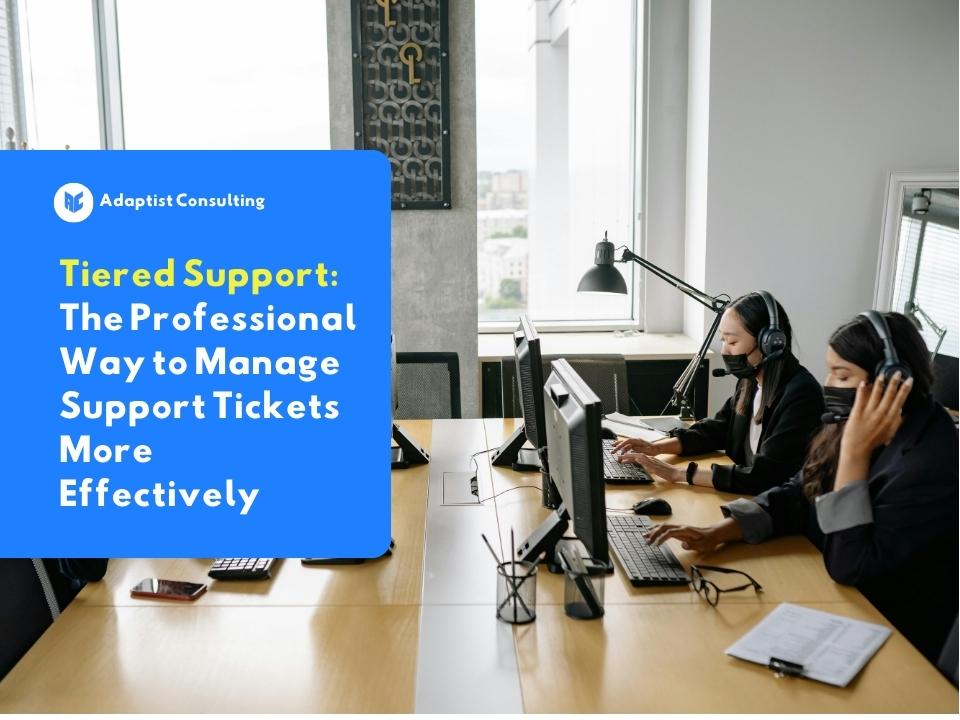 Employees collaborating on customer service tasks use the Tiered Support system to speed up technical ticket resolution in the office.