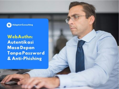Karyawan yang sedang melakukan autentikasi passwordless menggunakan kunci keamanan fisik berbasis protokol WebAuthn untuk mengakses infrastruktur jaringan perusahaan secara aman.